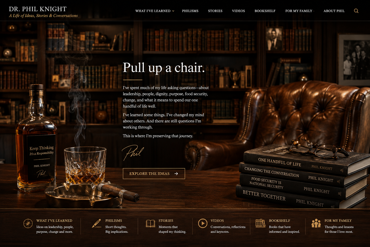A warm, dimly lit private library with dark wood shelves, leather chairs, and candlelight
